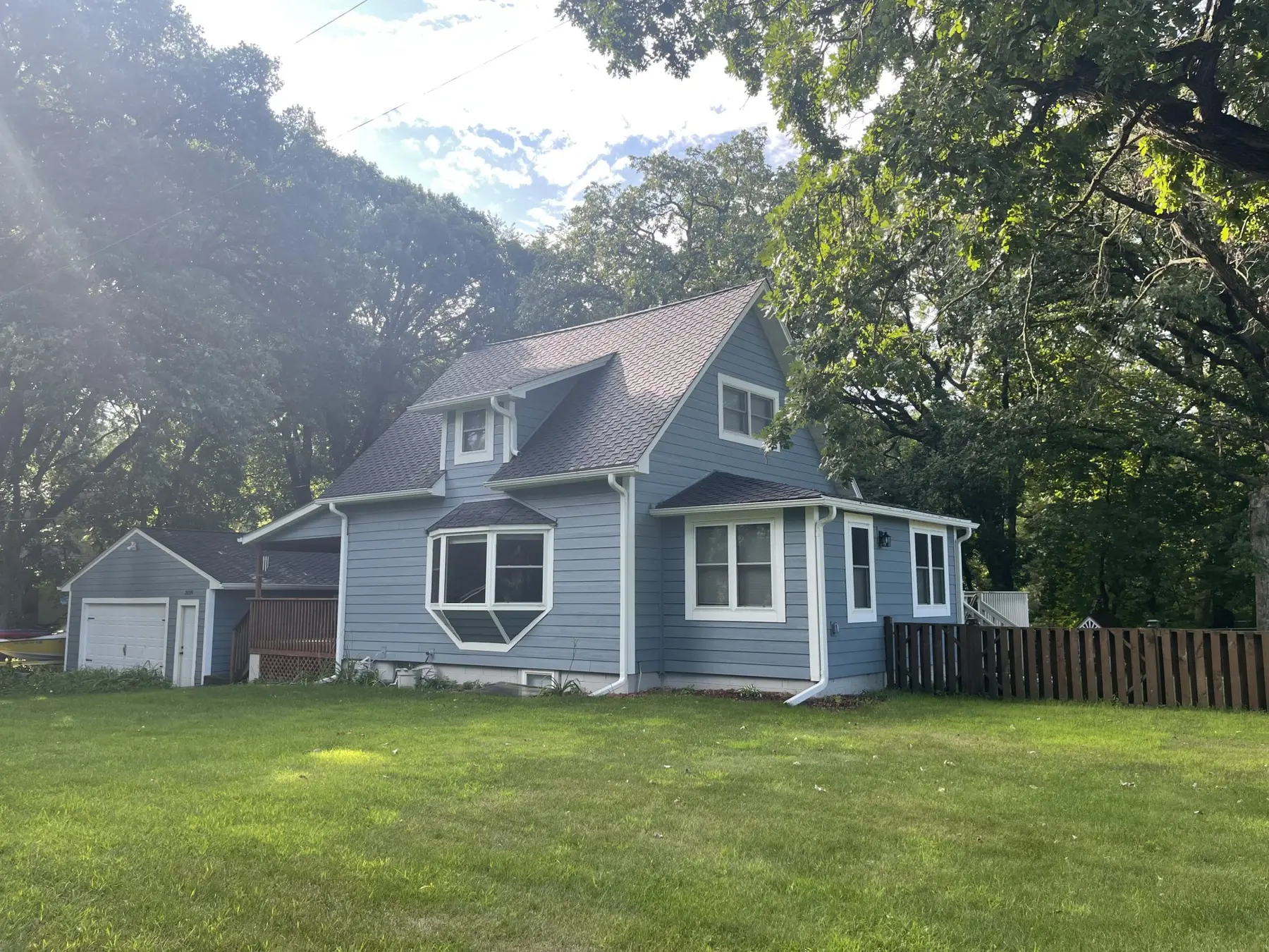Home exterior with professionally installed gutters