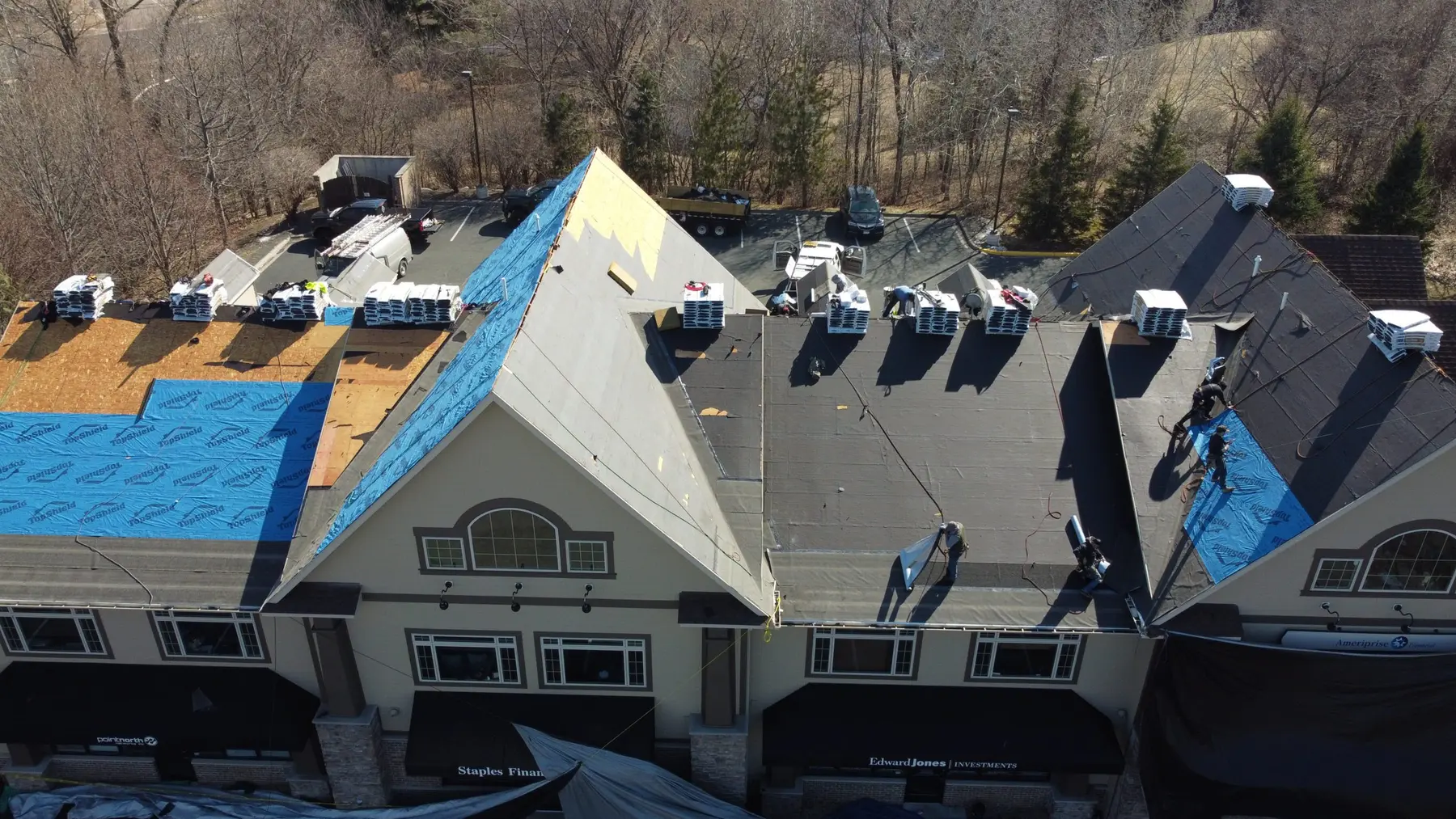 Solaris crew completing a commercial roofing project